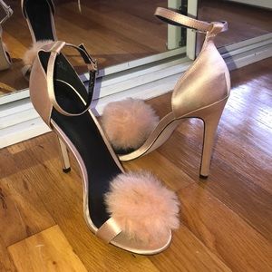 Pink pumps with Pom poms